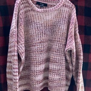 A multi colored sweater